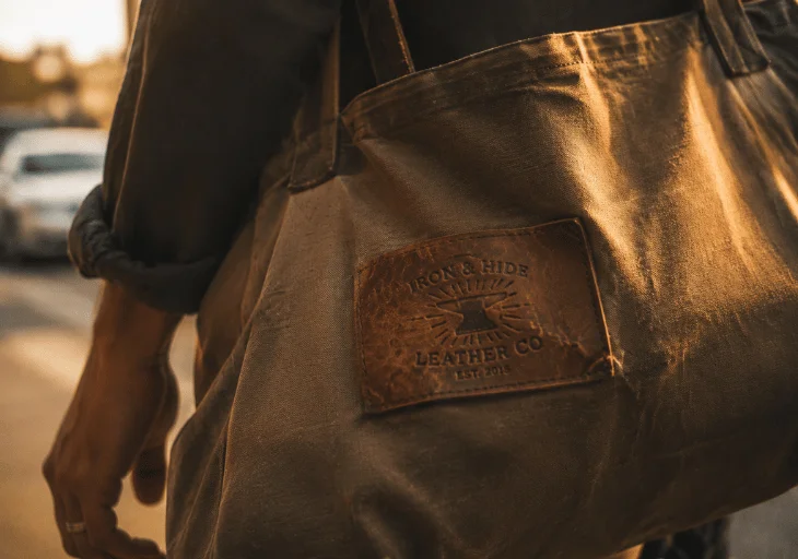 Genuine leather patch sewn onto a premium canvas bag